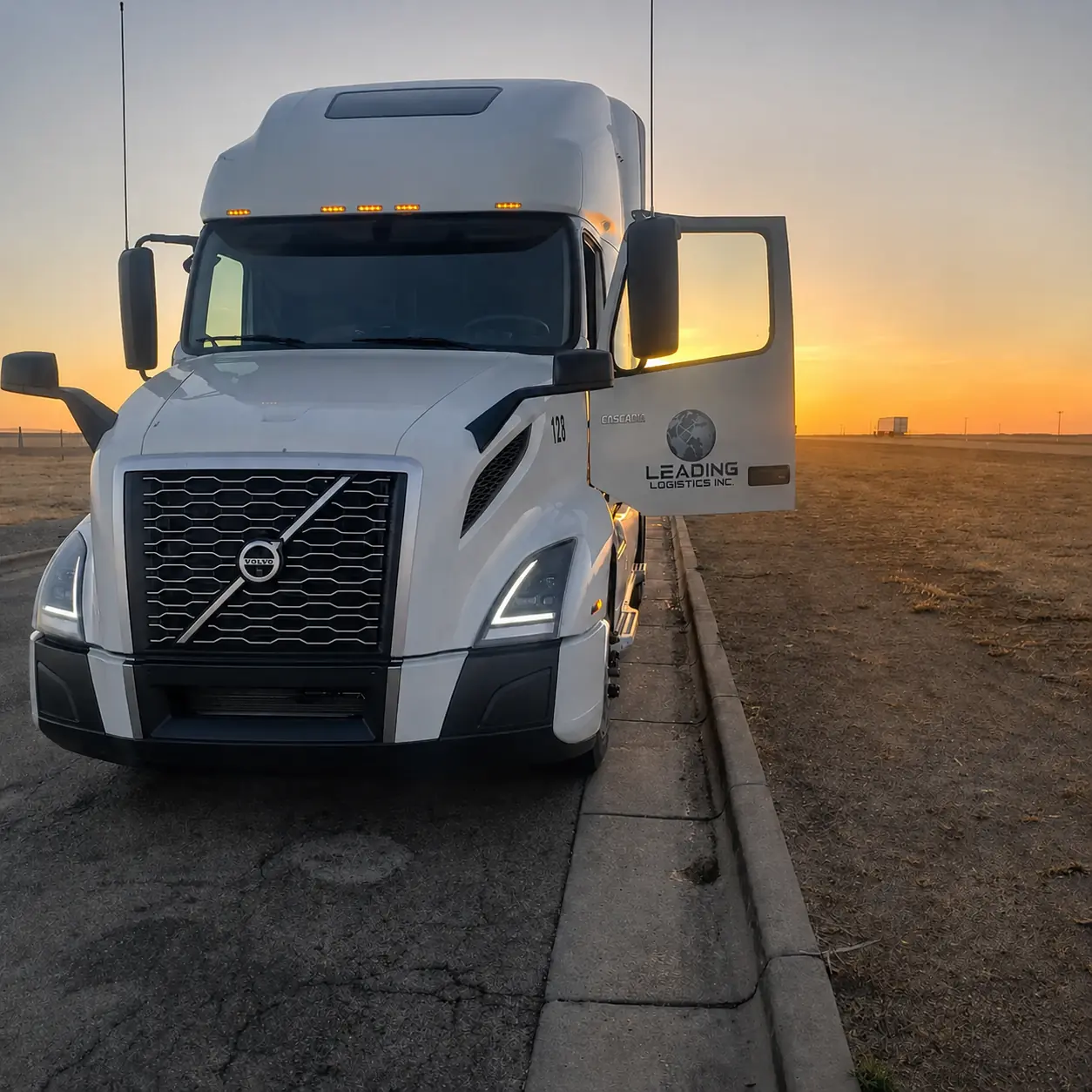 Leading Logistics Inc. Volvo tractor at sunrise
